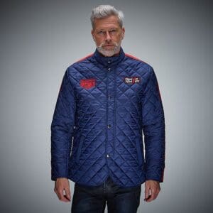 Man wearing a blue quilted jacket.